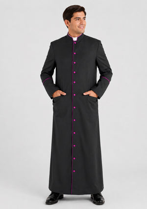 Man wearing a black clerical robe with pink trim on a white background