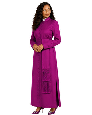 A woman modeling a long magenta-purple clerical cassock with a white collar, buttoned front, and fringe details, set against a plain white background.