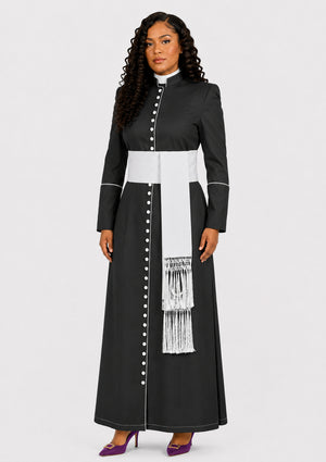 Woman wearing a black and white robe with a scarf on a white background