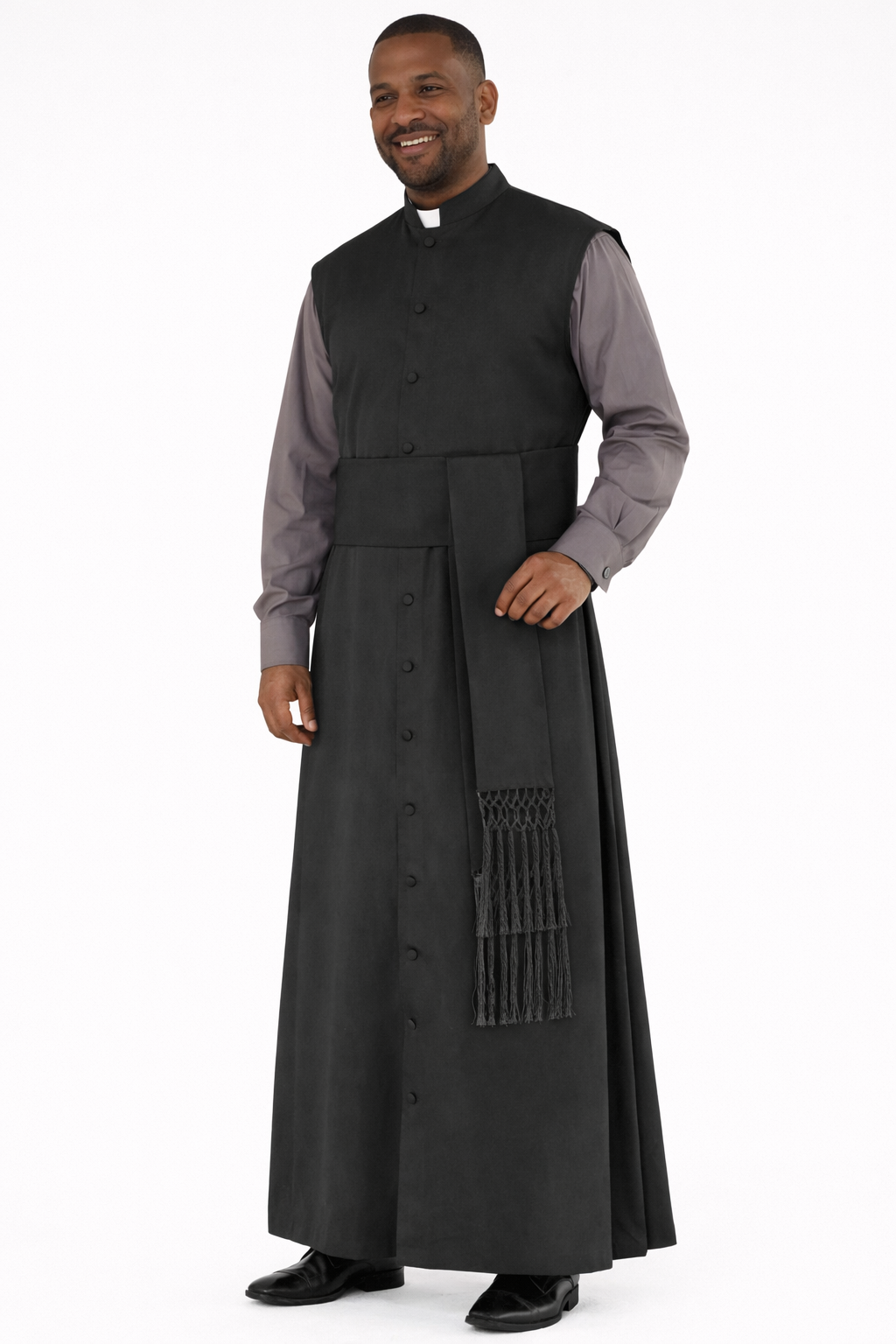 Man wearing a black cassock with a stole on a white background
