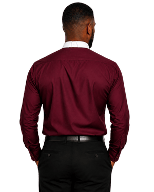 A man viewed from behind wearing a long-sleeve burgundy clerical shirt, black trousers, and a black belt against a plain white background.