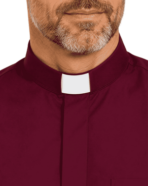 A close-up of a man's lower face and neck wearing a burgundy clerical collar with a white tab, set against a plain white background.