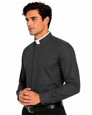 A man wearing a dark charcoal gray long-sleeve clerical shirt with a white collar, paired with a black belt and trousers, photographed against a solid white background.