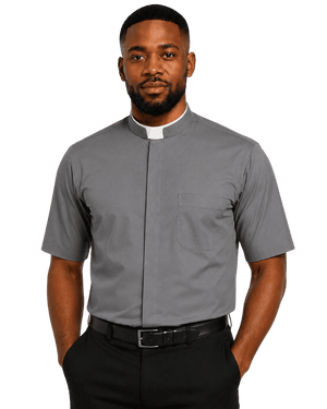 A man wearing a gray short-sleeve clerical shirt with a white collar tab, black trousers, and a black belt, photographed against a plain white background.