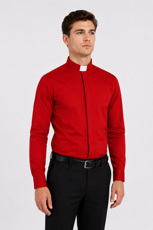 Man wearing a red shirt and black pants on a white background