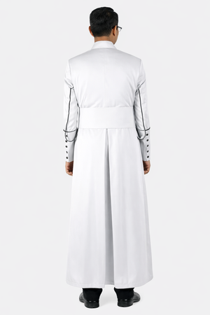 Man wearing a long white robe with black accents on a white background