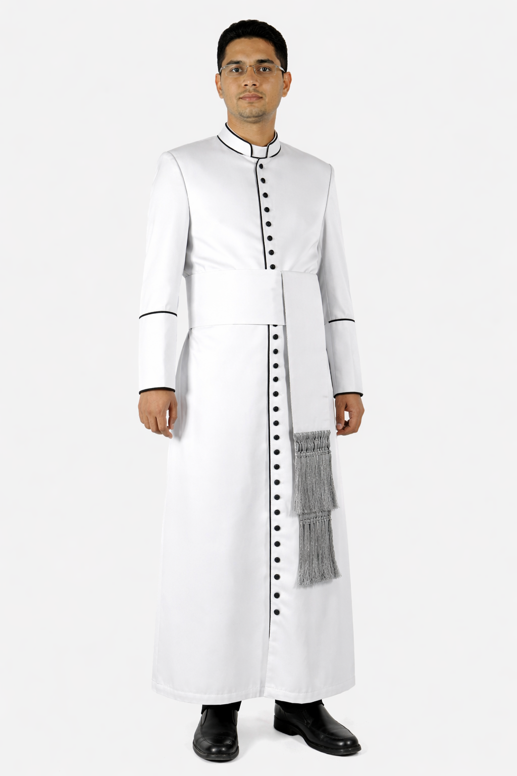 Man wearing a white traditional outfit with a sash on a white background
