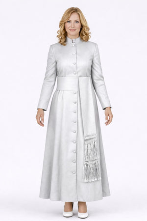 Woman wearing a long silver dress with a white background