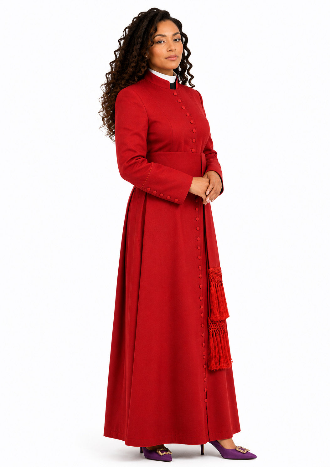 Woman wearing a red cassock with a white collar on a white background