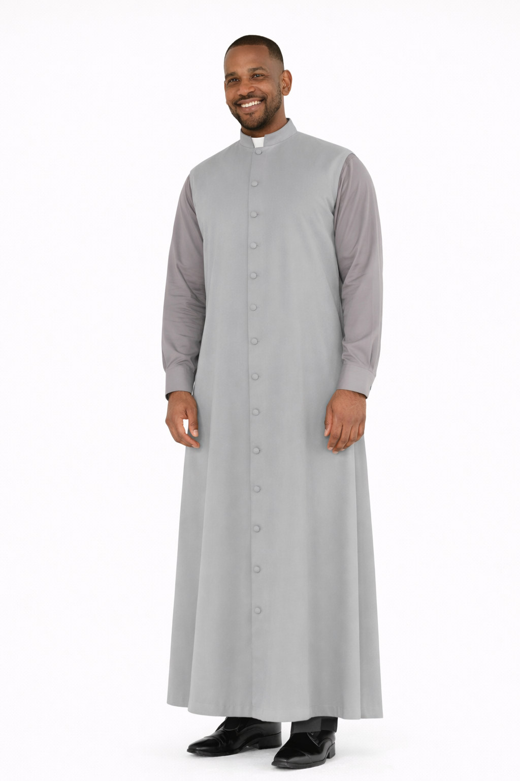 Man wearing a long gray robe with a white background