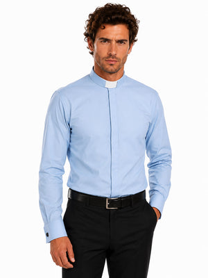 Man wearing a light blue clerical shirt with a collar on a white background