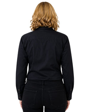 A woman viewed from the back wearing a black long-sleeve button-up shirt and black pants against a plain white background.