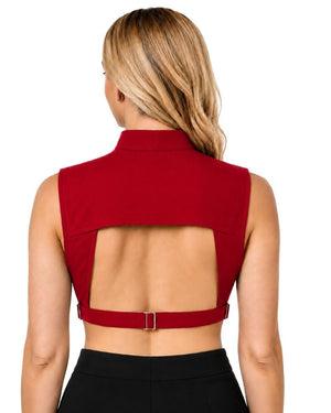 A woman shown from the back wearing a sleeveless red clergy dickey with an open back and a matching belt with a small gold buckle, paired with black bottoms against a white background.