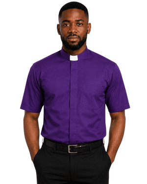 A man wearing a purple short-sleeve clerical shirt with a white collar tab, paired with black trousers and a black belt, photographed against a plain white background.