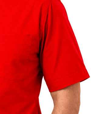 Close-up of a bright red short-sleeve clerical shirt with a chest pocket, worn by a model. The image is cropped tightly to show the fabric texture, sleeve cuff, and part of the arm against a plain white background.