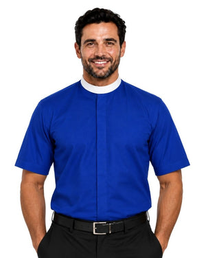 A smiling man wearing a royal blue short-sleeve clerical shirt with a white collar, paired with black trousers and a black belt, against a plain white background.
