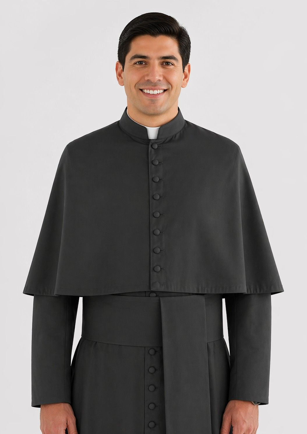 Man wearing a black cassock on a white background