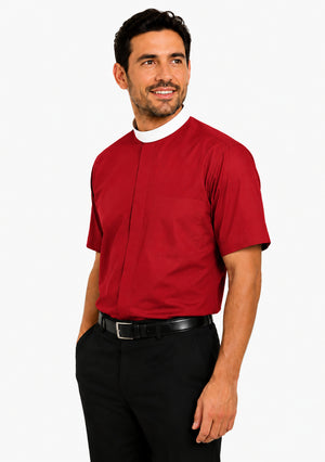 Man wearing a red clerical shirt with a white collar on a white background