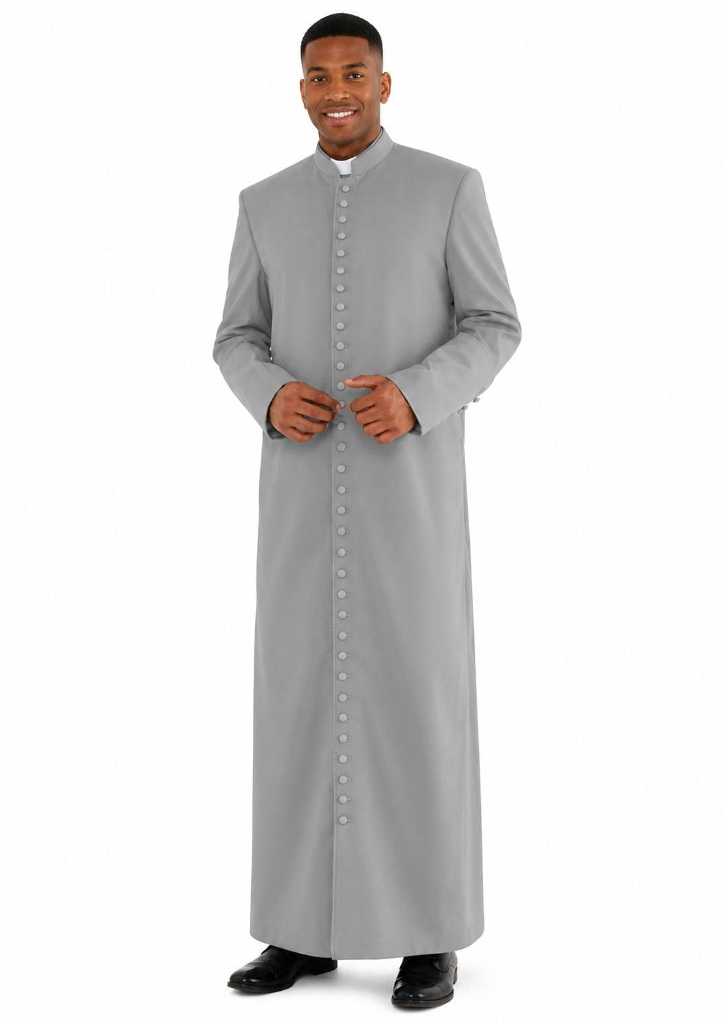 Man wearing a long gray coat on a white background