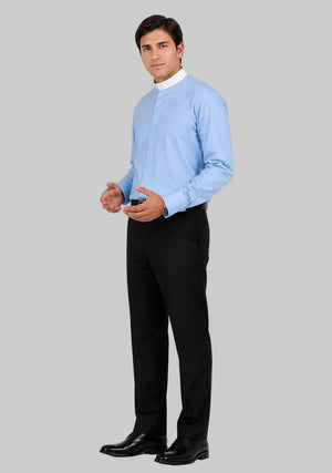 Man wearing a light blue dress shirt and black pants on a plain background