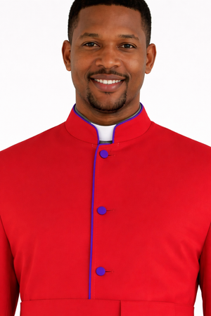 Man wearing a red outfit with purple buttons on a white background