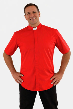 Man wearing a red clerical shirt with a white collar on a white background