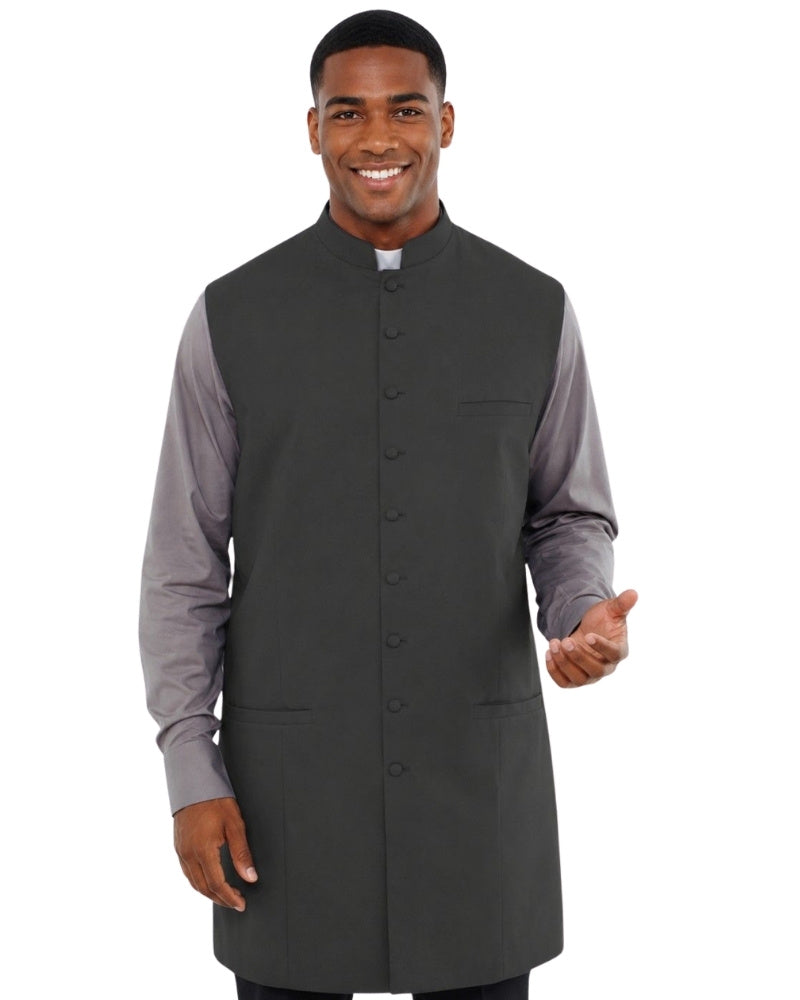 Man wearing a gray vest over a long-sleeve shirt on a white background