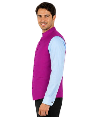 Man wearing a purple vest with purple trim with re trim over a light blue shirt on a white background.