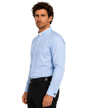 Man wearing a light blue long-sleeve shirt with a collar on a white background