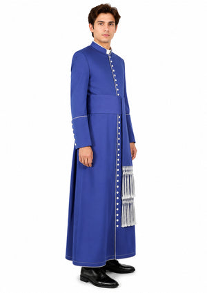 Man wearing a traditional blue robe with white patterns on a white background