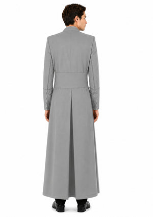 Person wearing a long gray robe on a white background