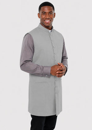 Man wearing a gray vest over a shirt on a white background