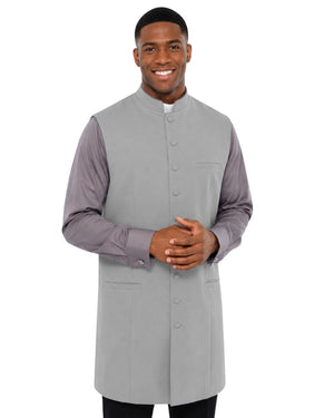 Man wearing a gray vest over a shirt on a white background