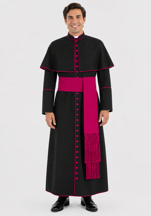 Man wearing a black robe with pink accents on a white background