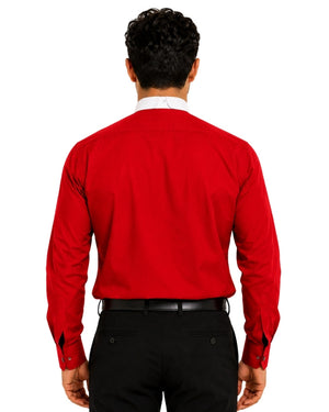 Man wearing a red clerical shirt with a white collar on a white background.