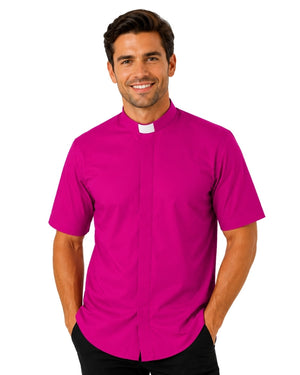 Man wearing a bright pink clerical shirt with a white collar on a white background