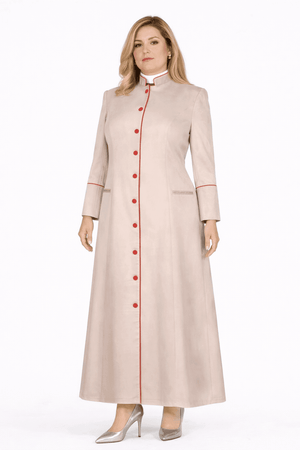 Woman wearing a long beige robe with red buttons on a white background