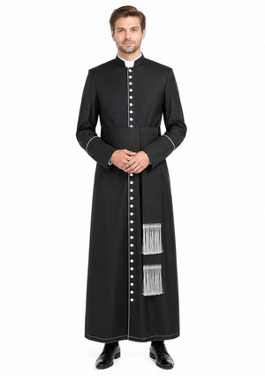 Man wearing a long black robe with white buttons on a white background