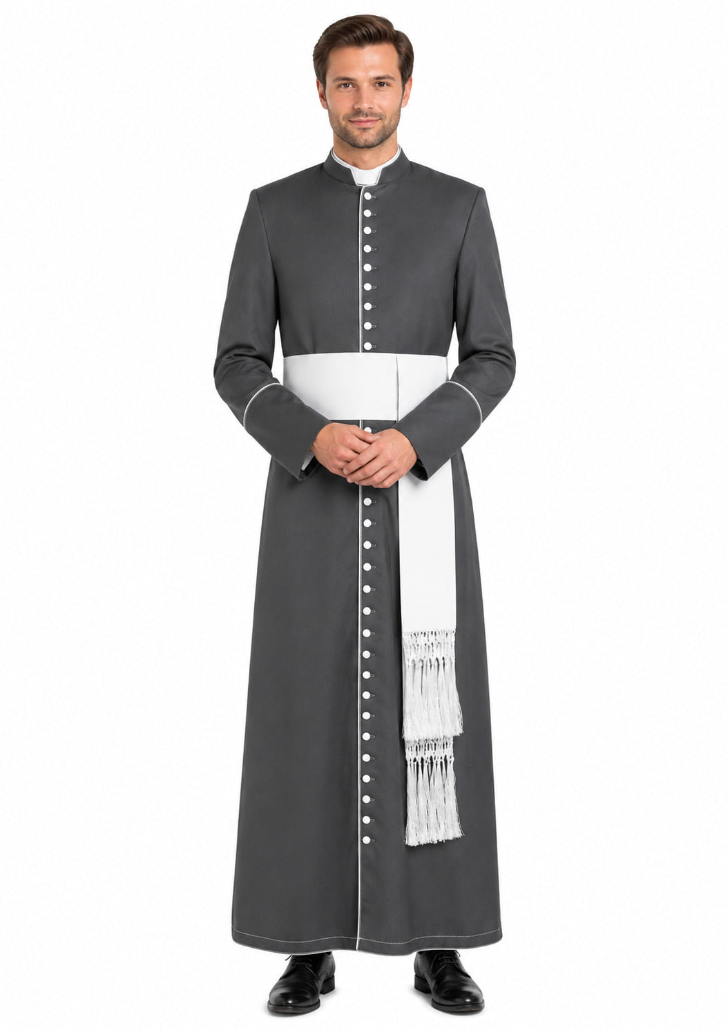 Man wearing a gray traditional robe with white accents on a white background