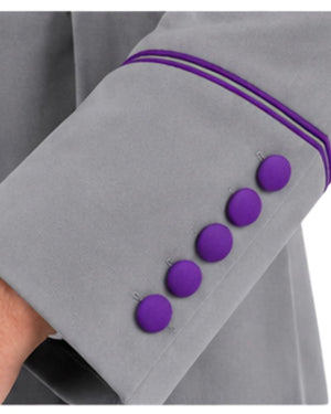 Close-up of a Purple Abdiel Clergy Cassock with five purple buttons and purple piping details, worn by a model.