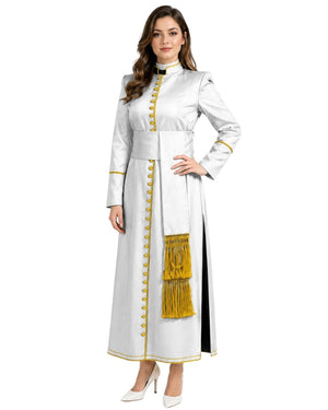 A woman modeling a long white cassock with gold trim, gold buttons, and a gold fringe panel, shown against a plain white background.