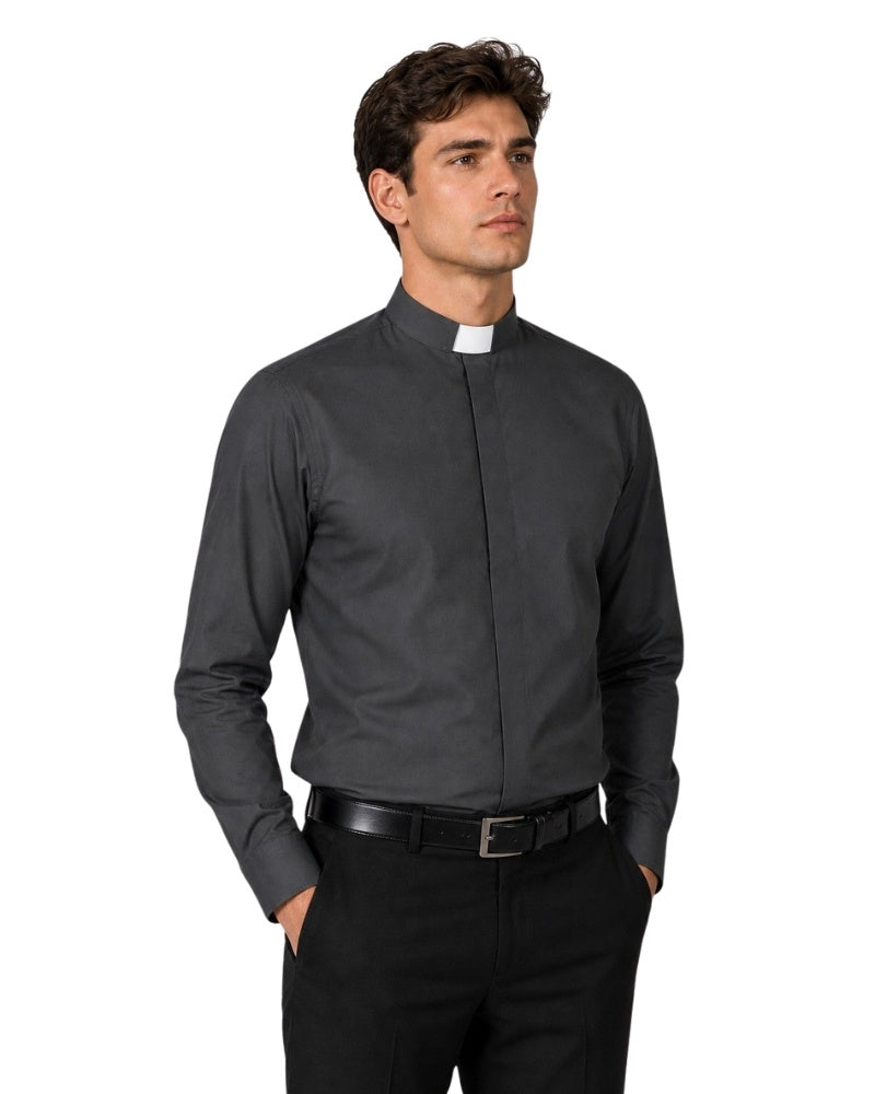 Man wearing a black clerical shirt with a white collar on a white background