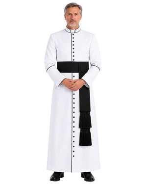 A man modeling White Clergy Cassock With Black Trim, a black waist sash, and black buttons, standing against a plain white background.