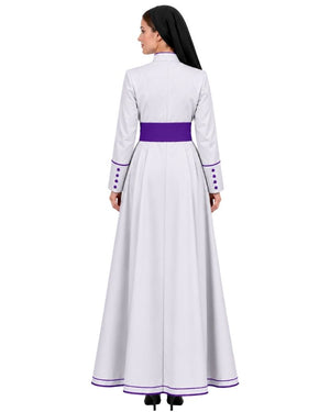 A woman shown from the back wearing a White Clerical Cassock With Purple Trim with a wide purple waistband and purple trim details on the cuffs and hem, against a plain white background.