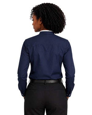 A woman shown from the back wearing a navy blue long-sleeve clerical shirt tucked into black dress pants with a black belt, against a plain white background.