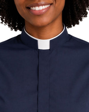 closeup of the women wearing navy blue clerical shirt against the plain white background.
