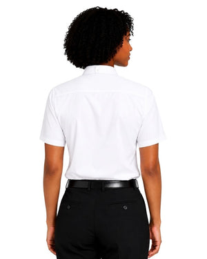 A woman shown from the back wearing a white short-sleeve clerical shirt tucked into black trousers with a black belt, against a plain white background.