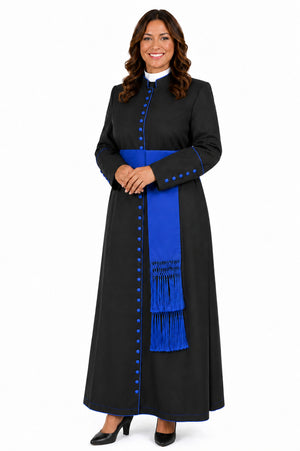 Woman wearing a black robe with blue accents on a white background