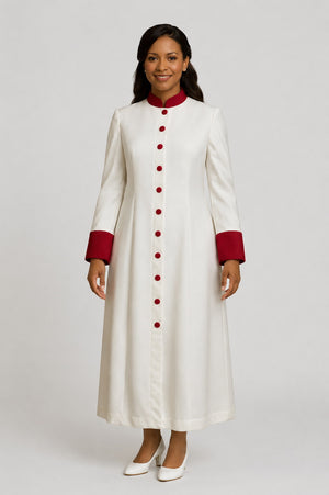 Woman wearing a long white robe with red cuffs on a white background