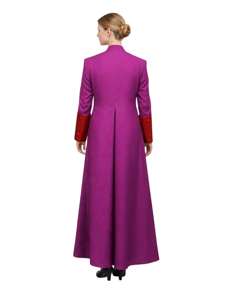 A woman shown from the back wearing a long magenta-purple cassock with contrasting red textured cuffs, photographed against a plain white background.